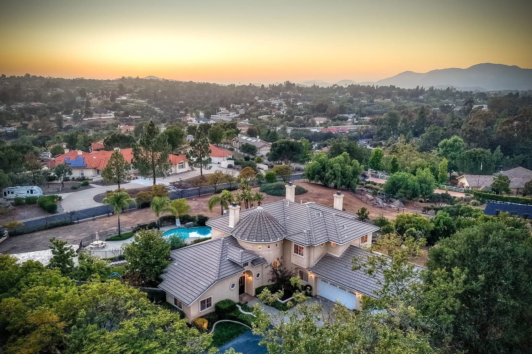 Aerial photo of a hillside property in Alpine